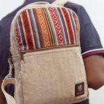 man carrying hemp bag on his shoulder - indian hemp store
